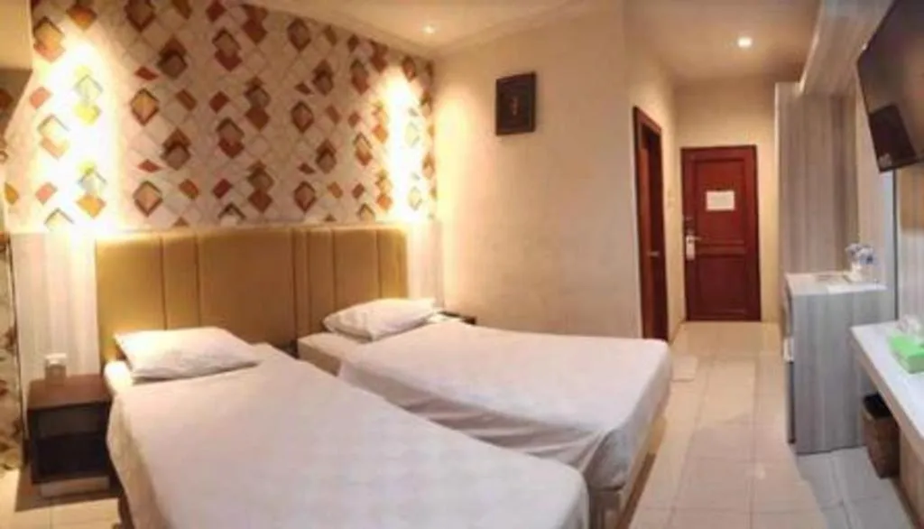 Bed in Jelita Tanjung Hotel