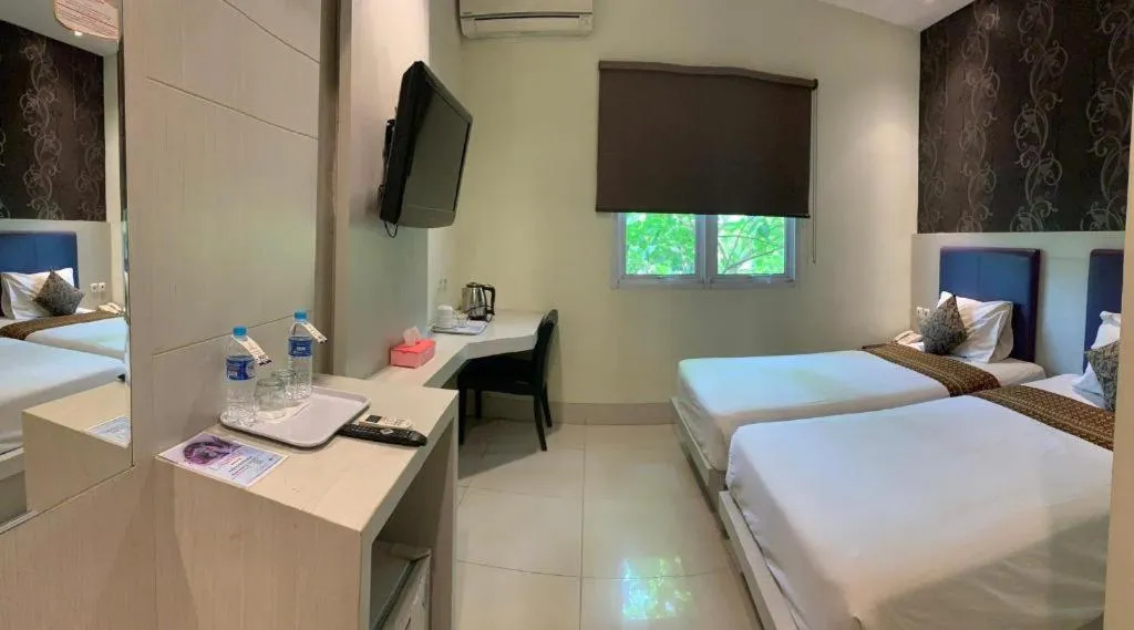 Bed in Jelita Tanjung Hotel