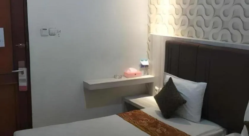 Bed in Jelita Tanjung Hotel