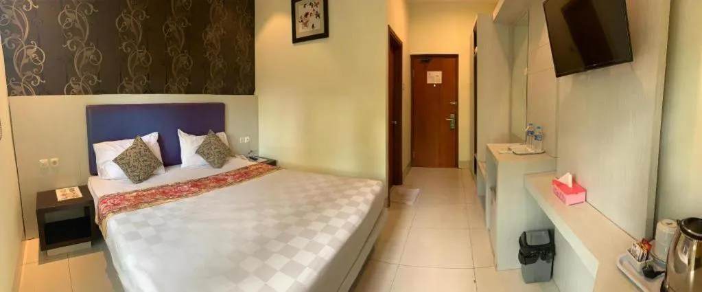 Bed in Jelita Tanjung Hotel