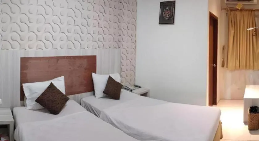 Bed in Jelita Tanjung Hotel