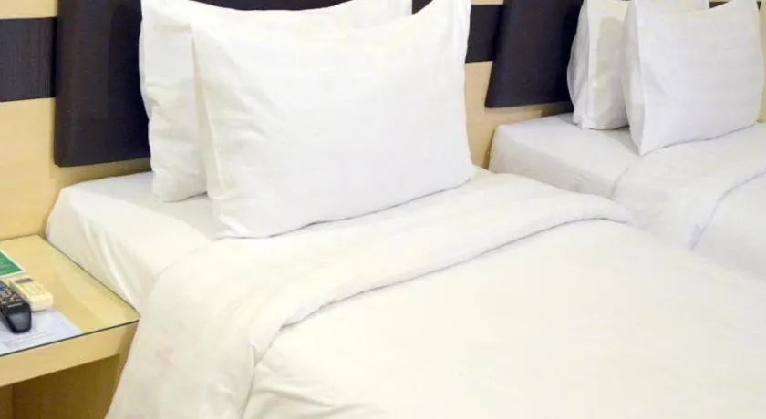 Bed in Sumi Hotel Mangga Besar
