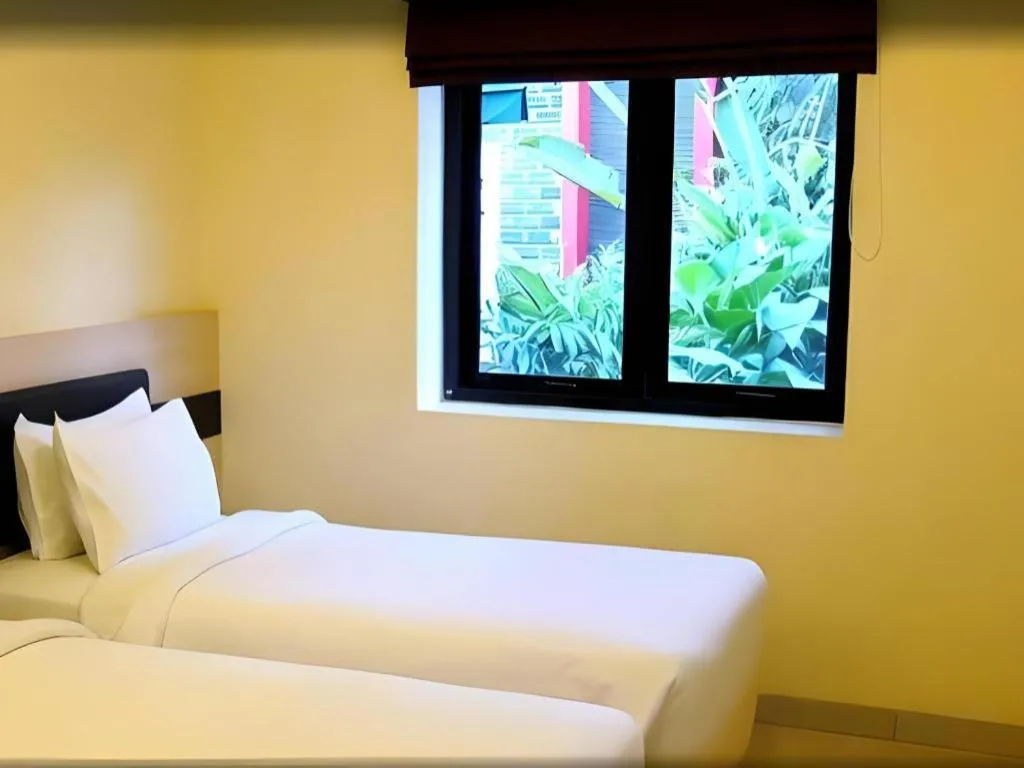 Bed in Sumi Hotel Mangga Besar