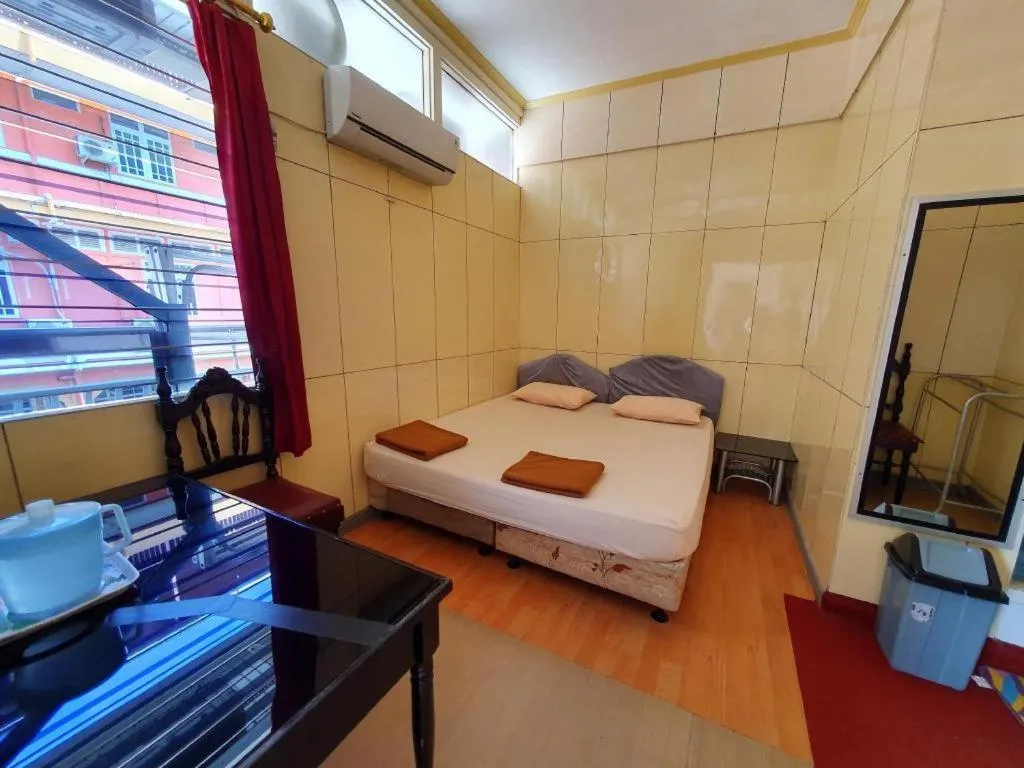 Bed in Hotel Sinar Khatulistiwa