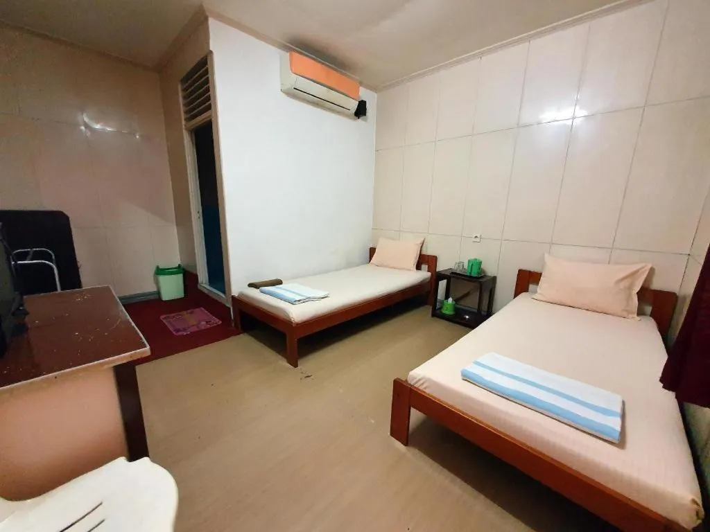 Bed in Hotel Sinar Khatulistiwa