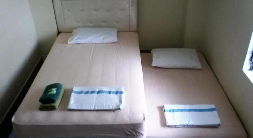 Bed in Hotel Sinar Khatulistiwa