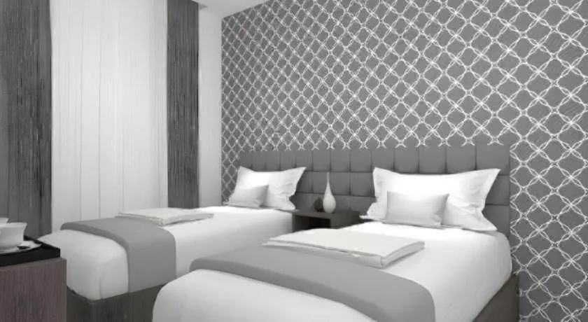 Bed in Smart Budget Hotel