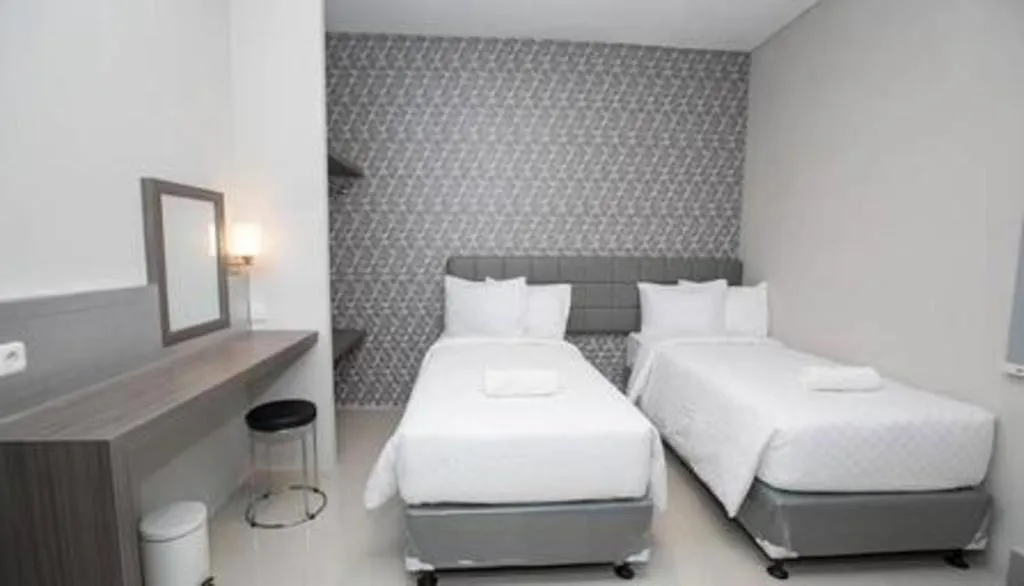 Bed in Smart Budget Hotel