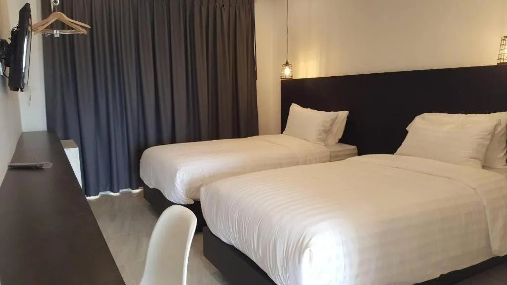 Bed in Chic-Chidkong Boutique Hotel