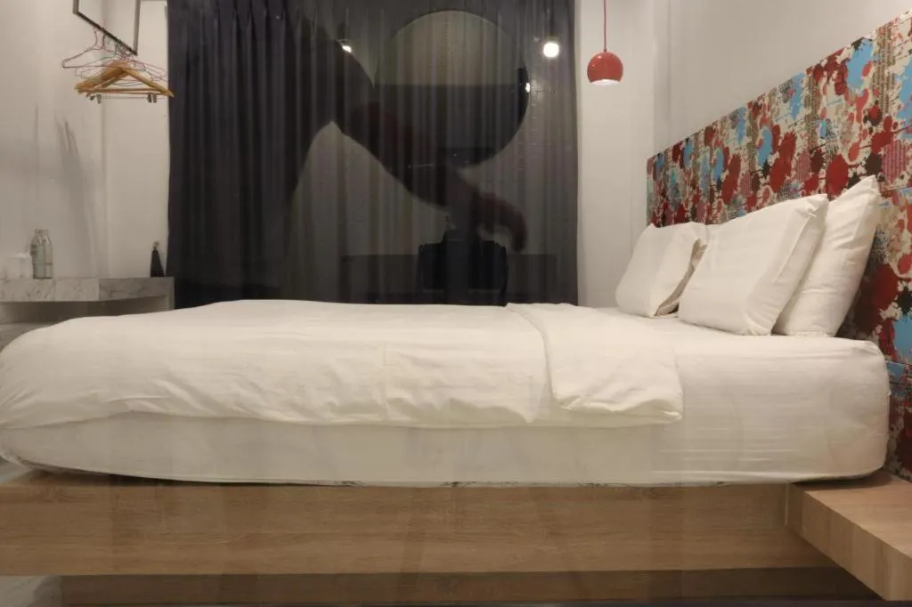 Bed in Chic-Chidkong Boutique Hotel