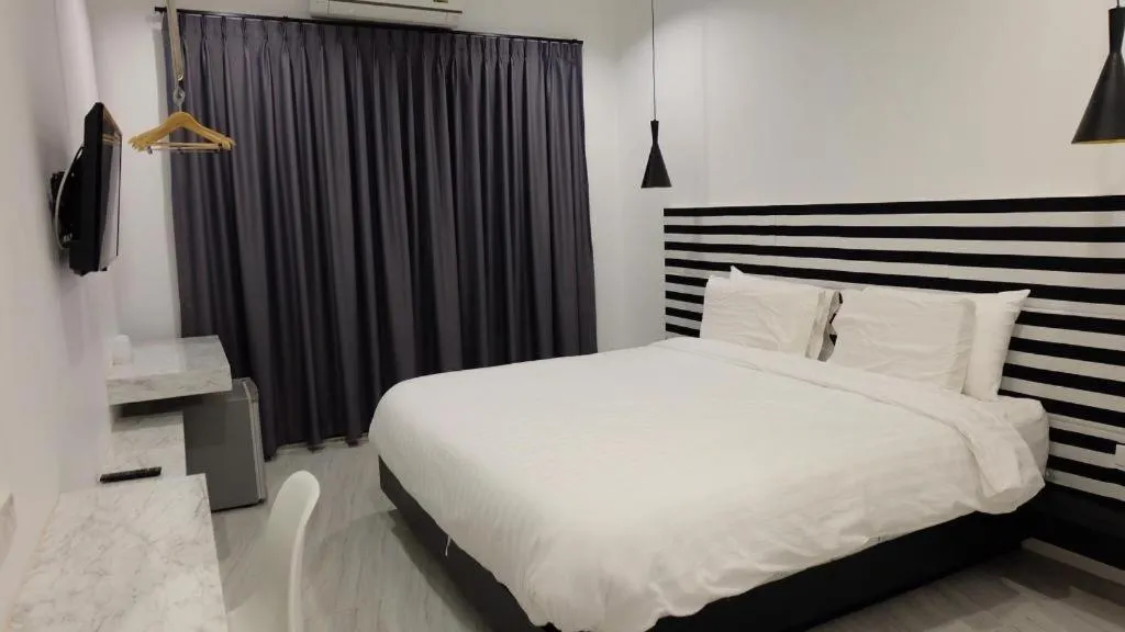 Bed in Chic-Chidkong Boutique Hotel