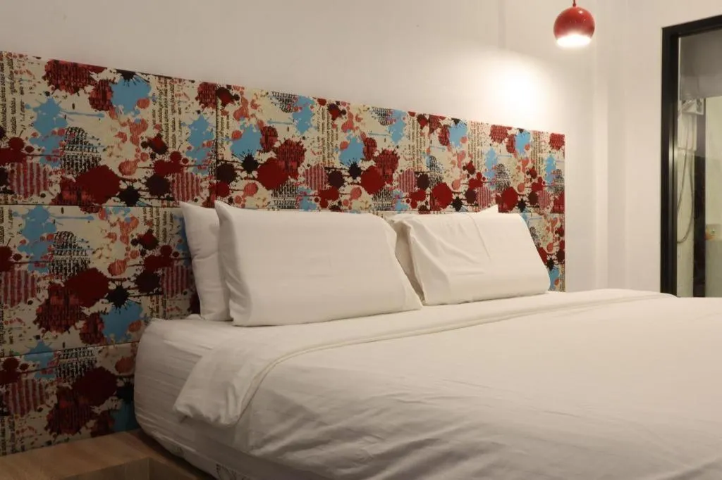 Bed in Chic-Chidkong Boutique Hotel