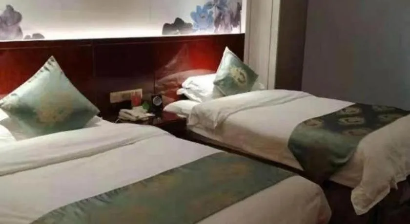 Bed in GreenTree Eastern Yancheng Binhai County Aobaolia Beichen Hotel