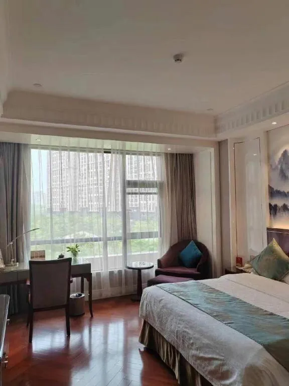 Bed in GreenTree Eastern Yancheng Binhai County Aobaolia Beichen Hotel