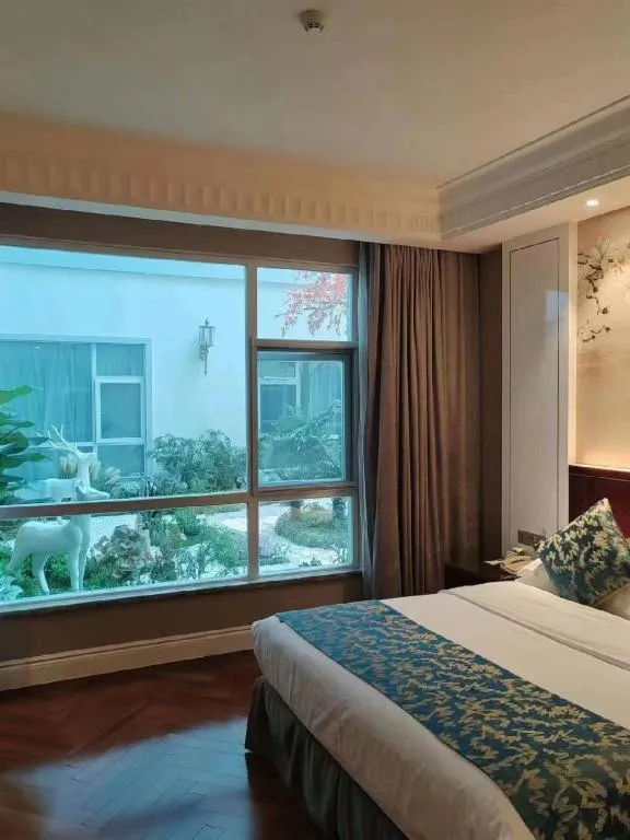 Bed in GreenTree Eastern Yancheng Binhai County Aobaolia Beichen Hotel