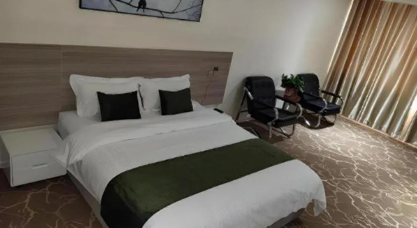 Bed in GreenTree Inn Yancheng Xiangshui Bus Station Express Hotel