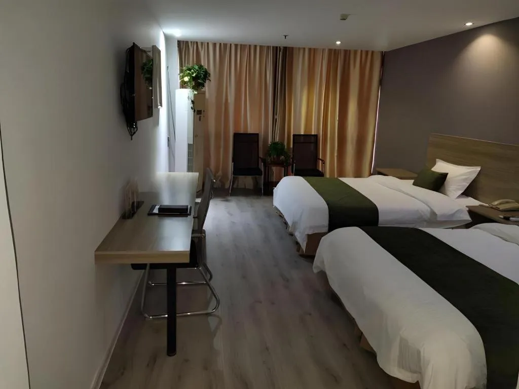 Bed in GreenTree Inn Yancheng Xiangshui Bus Station Express Hotel