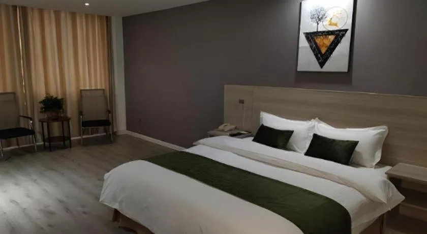 Bed in GreenTree Inn Yancheng Xiangshui Bus Station Express Hotel