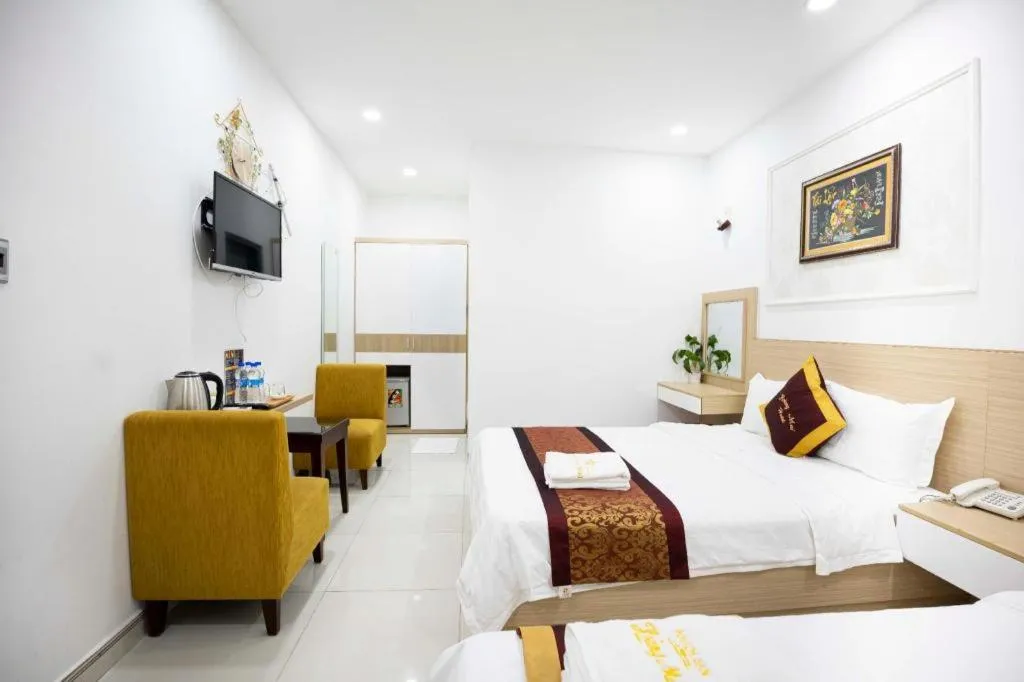 Bed in Hoang Mai Hotel