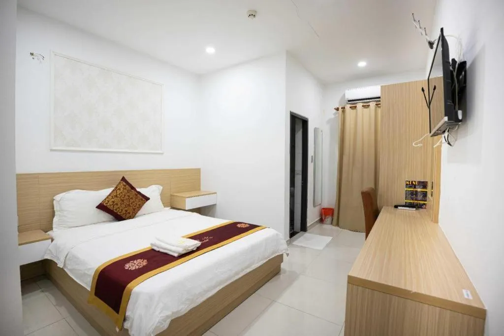 Bed in Hoang Mai Hotel