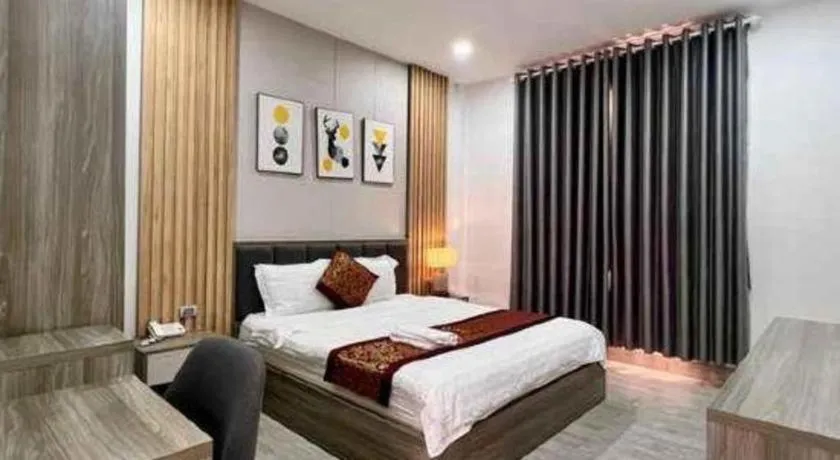 Bed in Hoang Mai Hotel