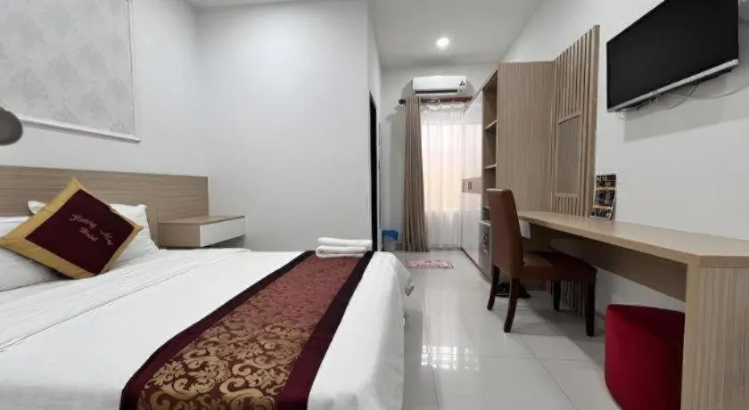 Bed in Hoang Mai Hotel