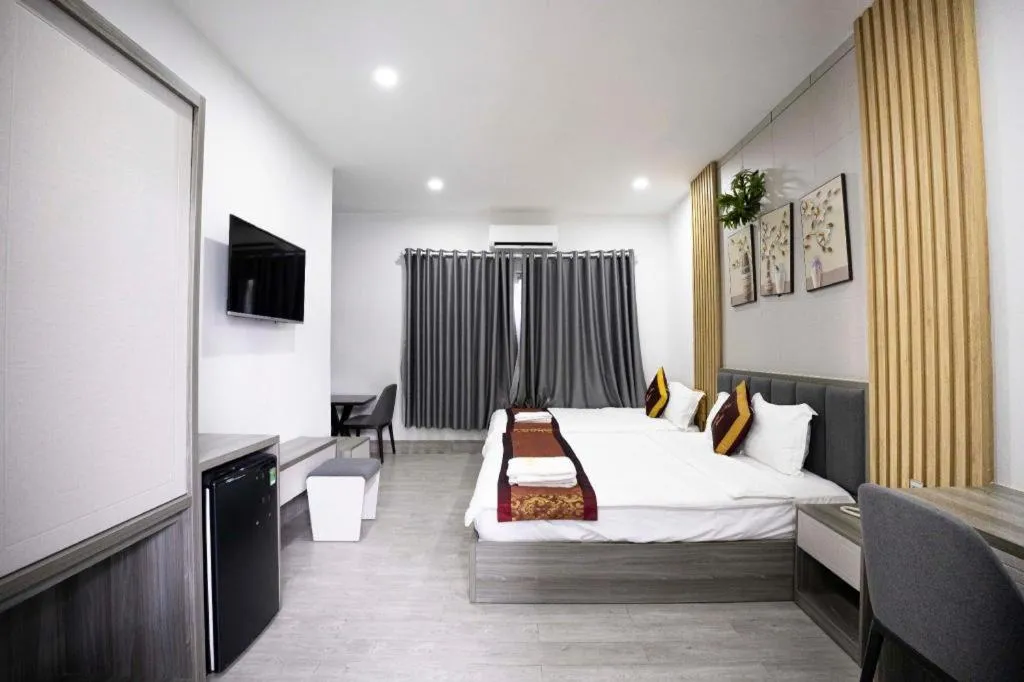 Bed in Hoang Mai Hotel