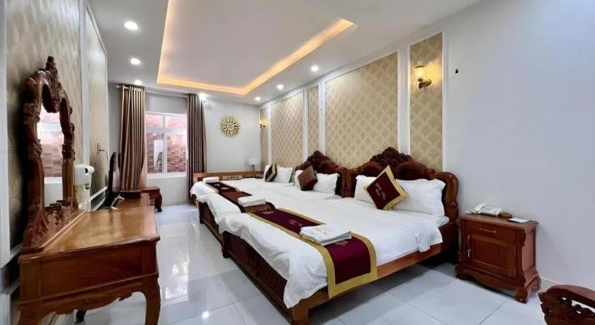 Bed in Hoang Mai Hotel