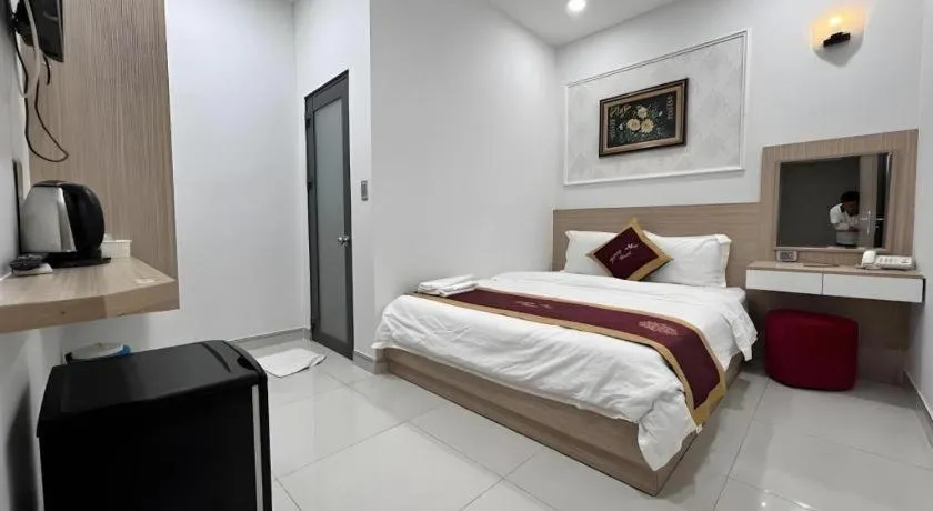 Bed in Hoang Mai Hotel