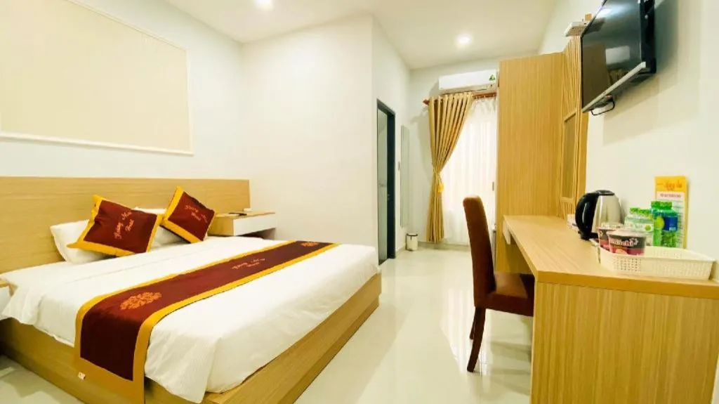 Bed in Hoang Mai Hotel