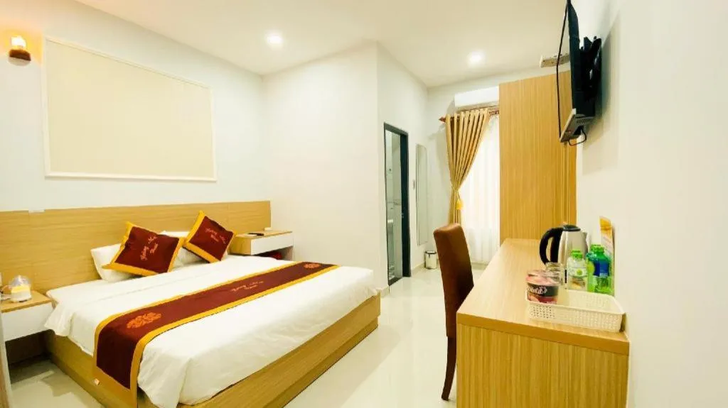 Bed in Hoang Mai Hotel