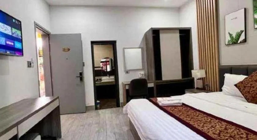 Bed in Hoang Mai Hotel