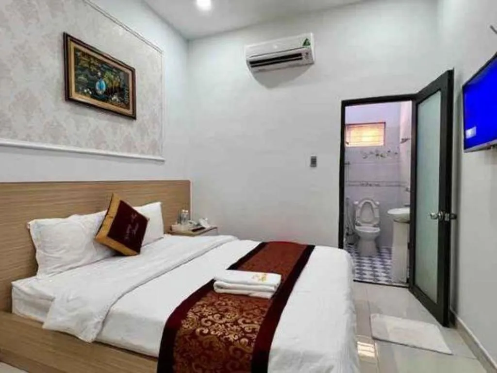 Bed in Hoang Mai Hotel