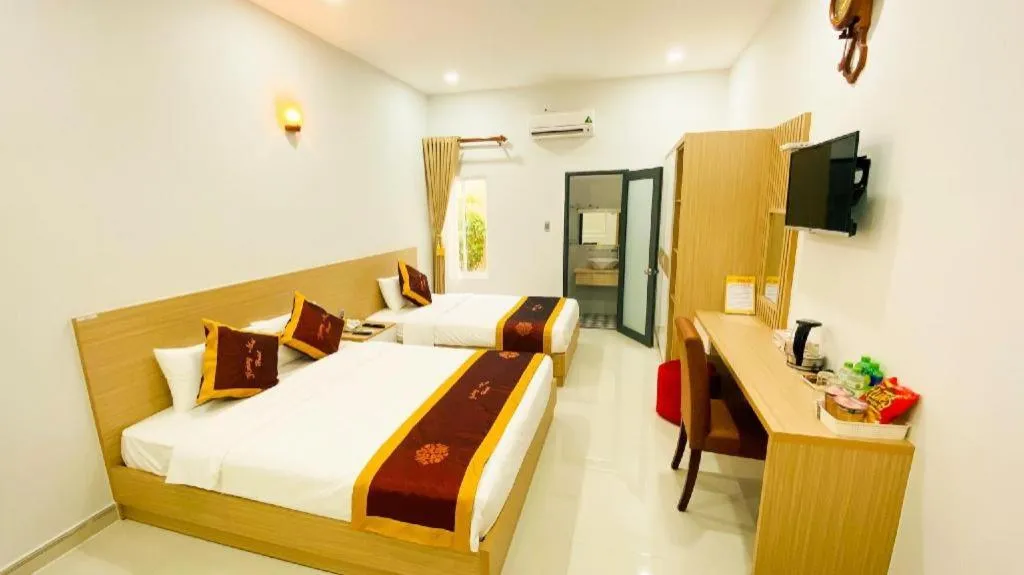 Bed in Hoang Mai Hotel