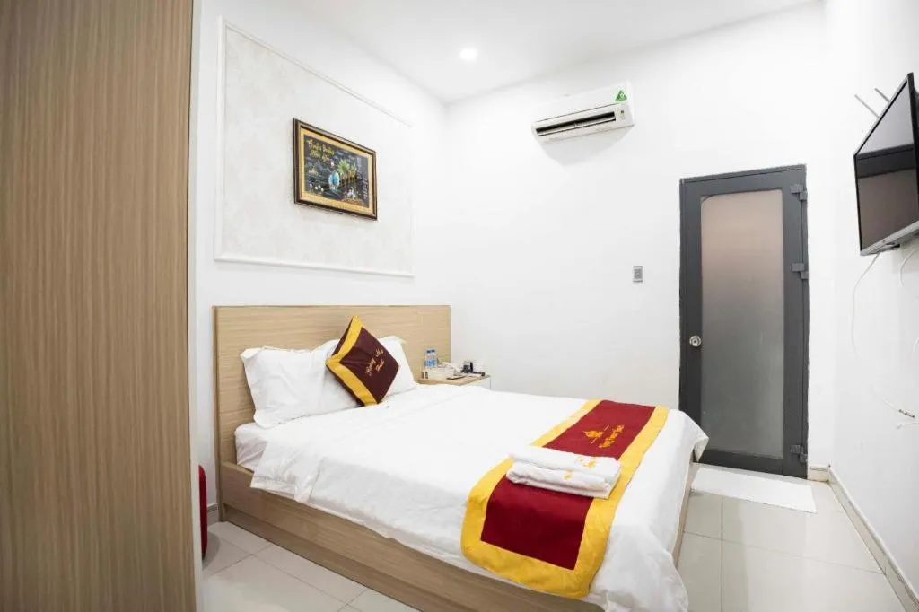 Bed in Hoang Mai Hotel