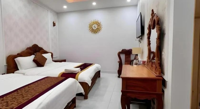 Bed in Hoang Mai Hotel