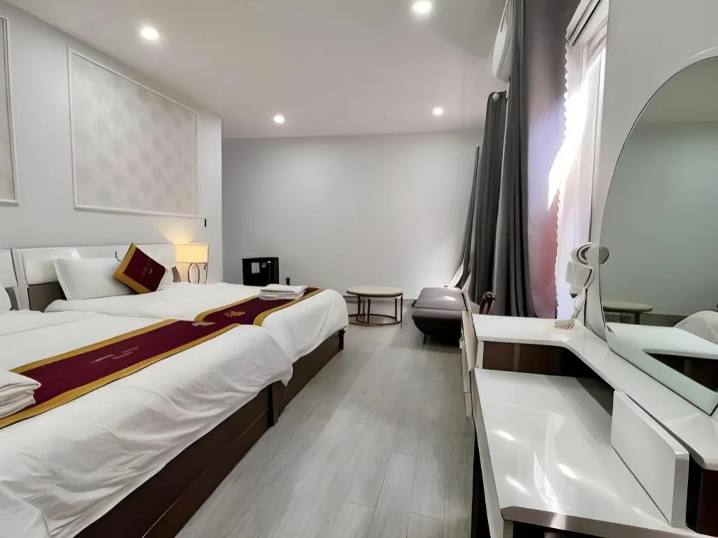 Bed in Hoang Mai Hotel