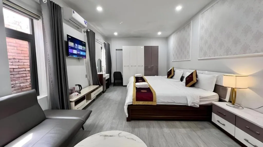 Bed in Hoang Mai Hotel