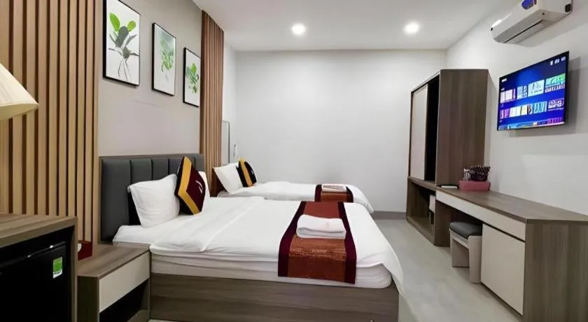 Bed in Hoang Mai Hotel