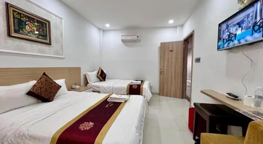 Bed in Hoang Mai Hotel