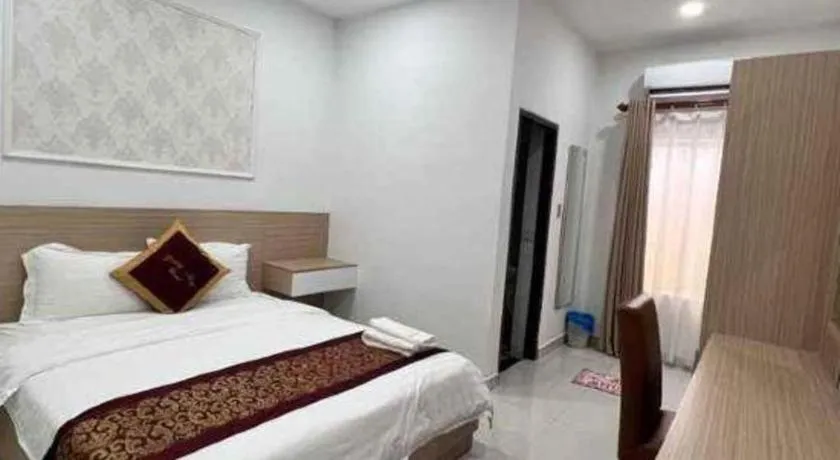 Bed in Hoang Mai Hotel