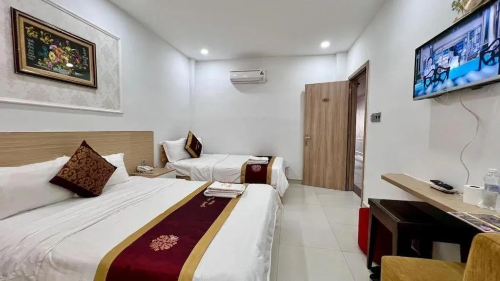 Bed in Hoang Mai Hotel