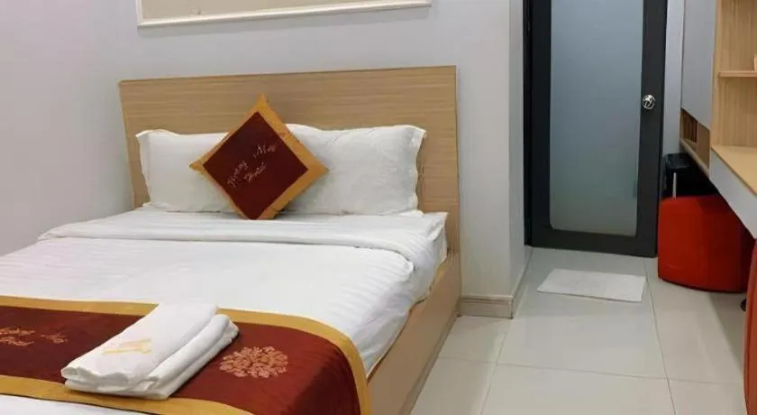 Bed in Hoang Mai Hotel