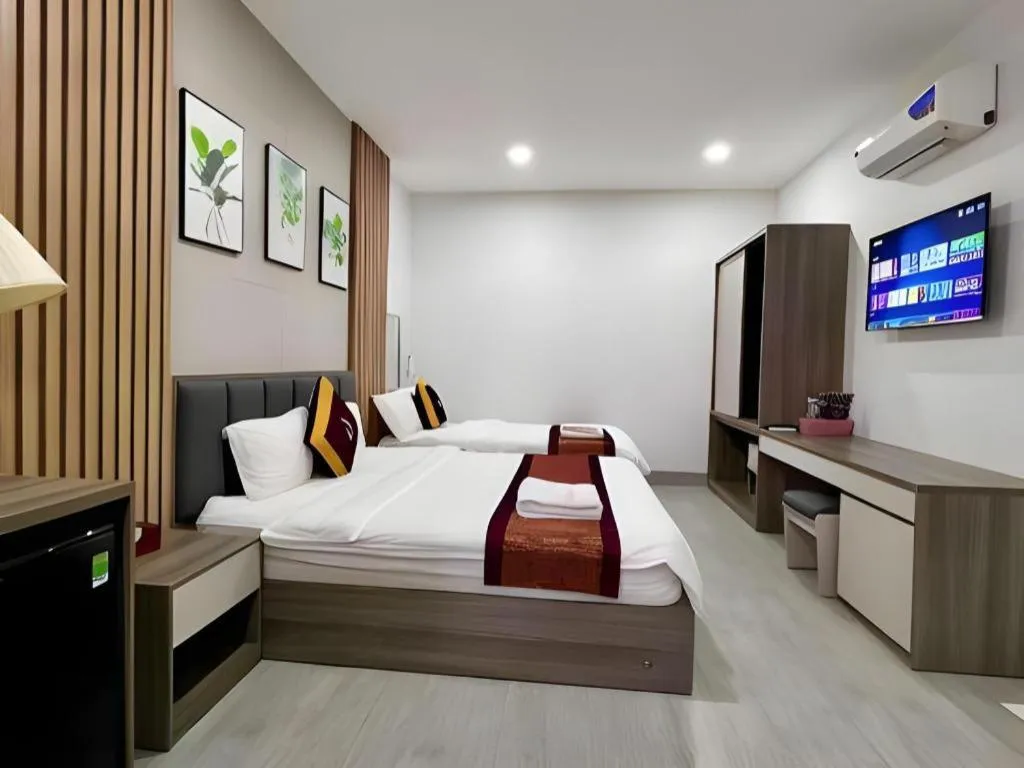 Bed in Hoang Mai Hotel