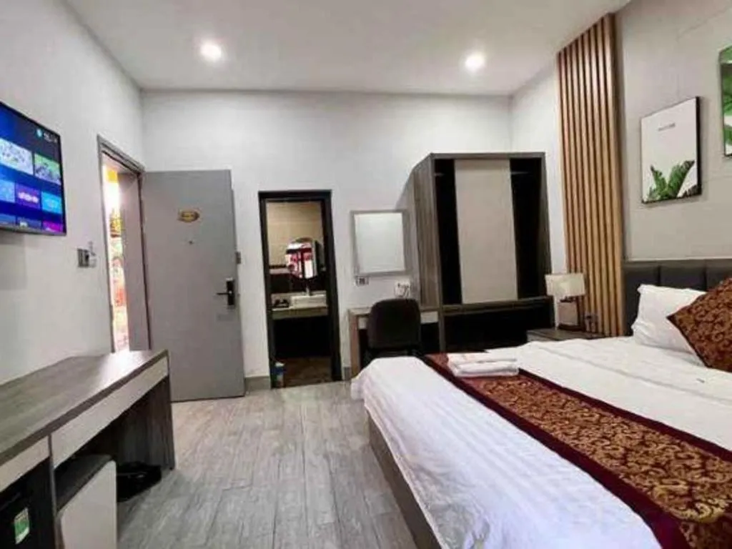 Bed in Hoang Mai Hotel