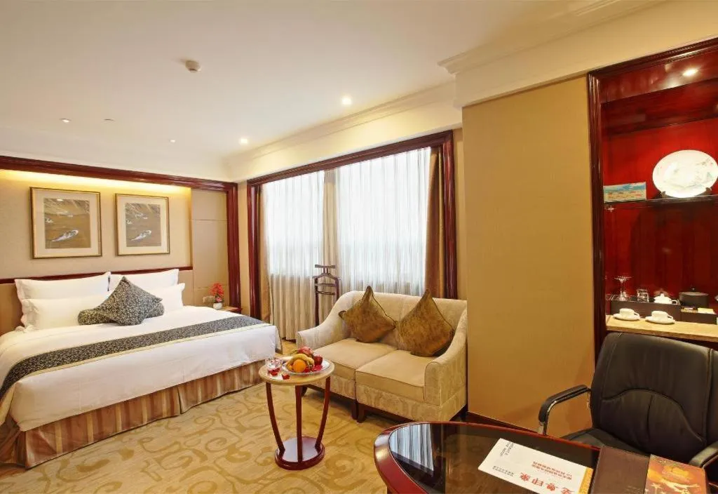 Bed in Chutian Guangdong International Hotel