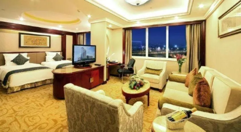 Bed in Chutian Guangdong International Hotel