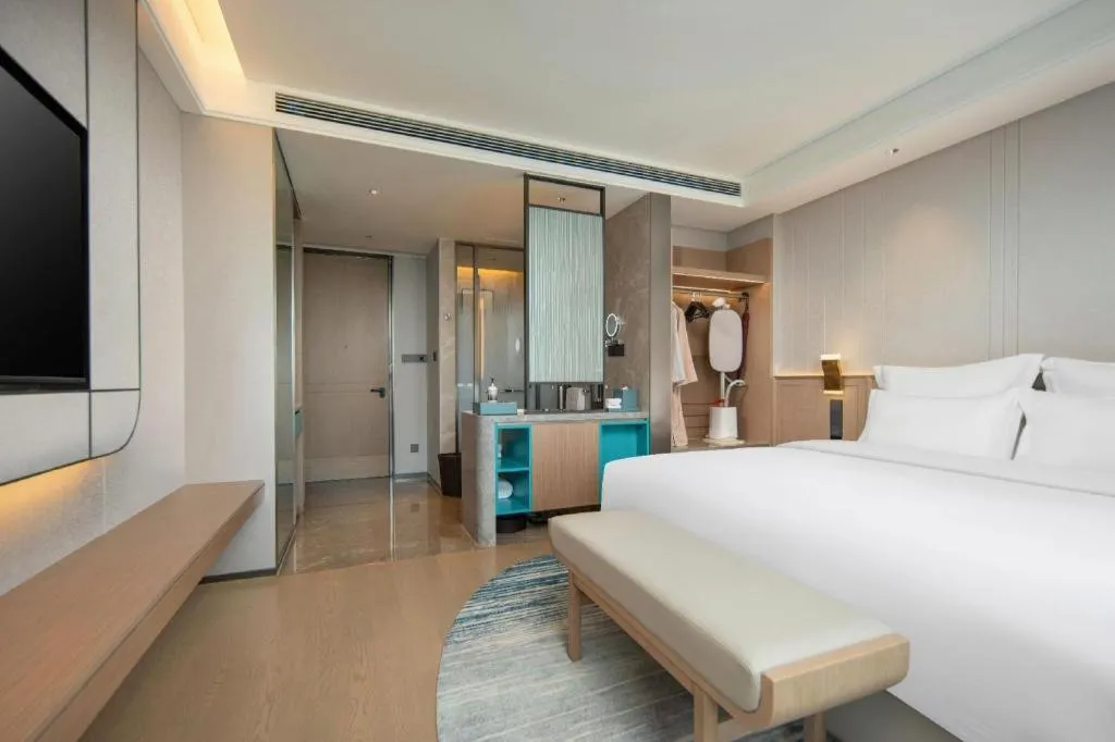 Bed in Chutian Guangdong International Hotel