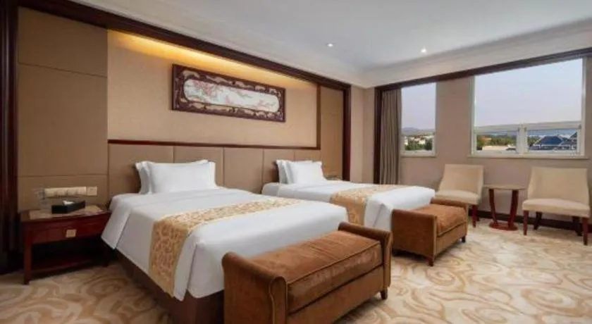 Bed in Chutian Guangdong International Hotel