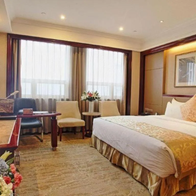 Bed in Chutian Guangdong International Hotel